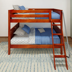Wooden bunk bed with blue striped bedding and polka dot pillows in a modern bedroom.