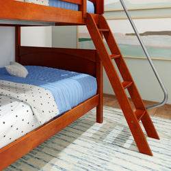 Wooden bunk bed with blue bedding and ladder, set in a cozy bedroom with modern decor.