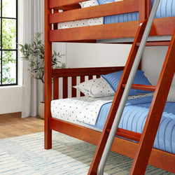 Wooden bunk bed with blue bedding and star-patterned pillows in a bright, cozy bedroom.
