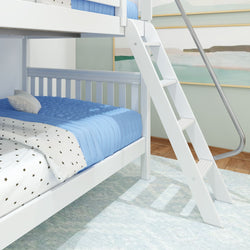 White bunk bed with blue bedding and ladder in a modern bedroom setting.