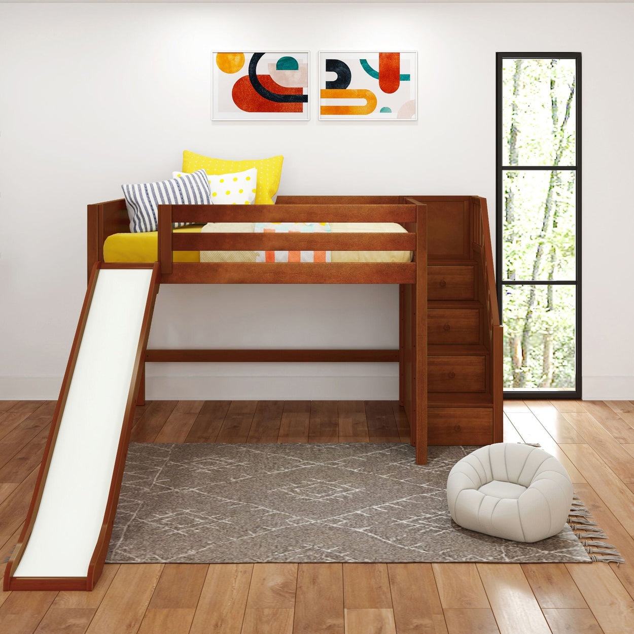 Wooden loft bed with slide and stairs, colorful pillows, and modern wall art in a bright children's room.