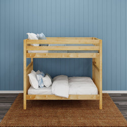 Wooden bunk bed with white bedding in a room with a blue paneled wall.
