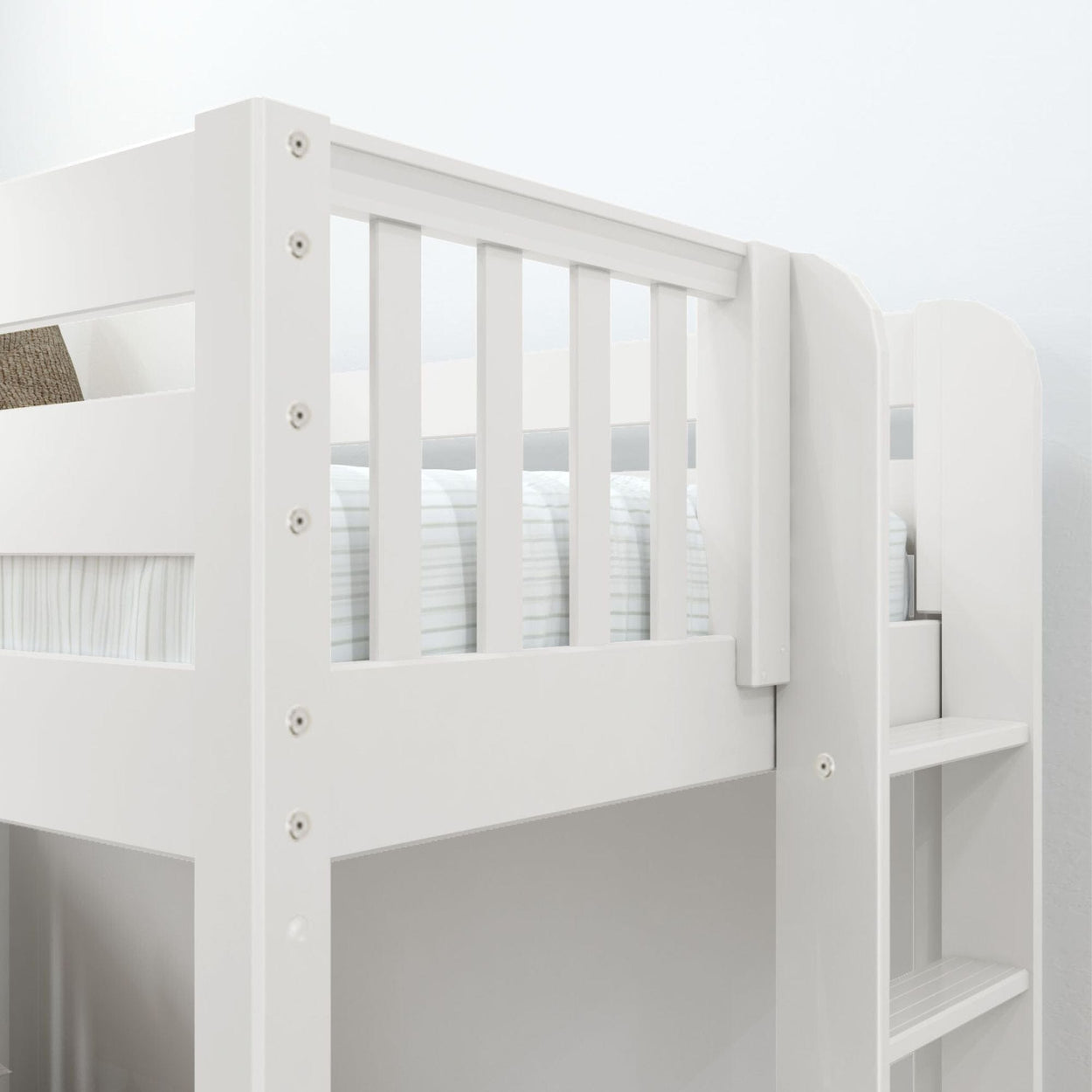 White wooden bunk bed with ladder and safety rail for kids' bedroom furniture.