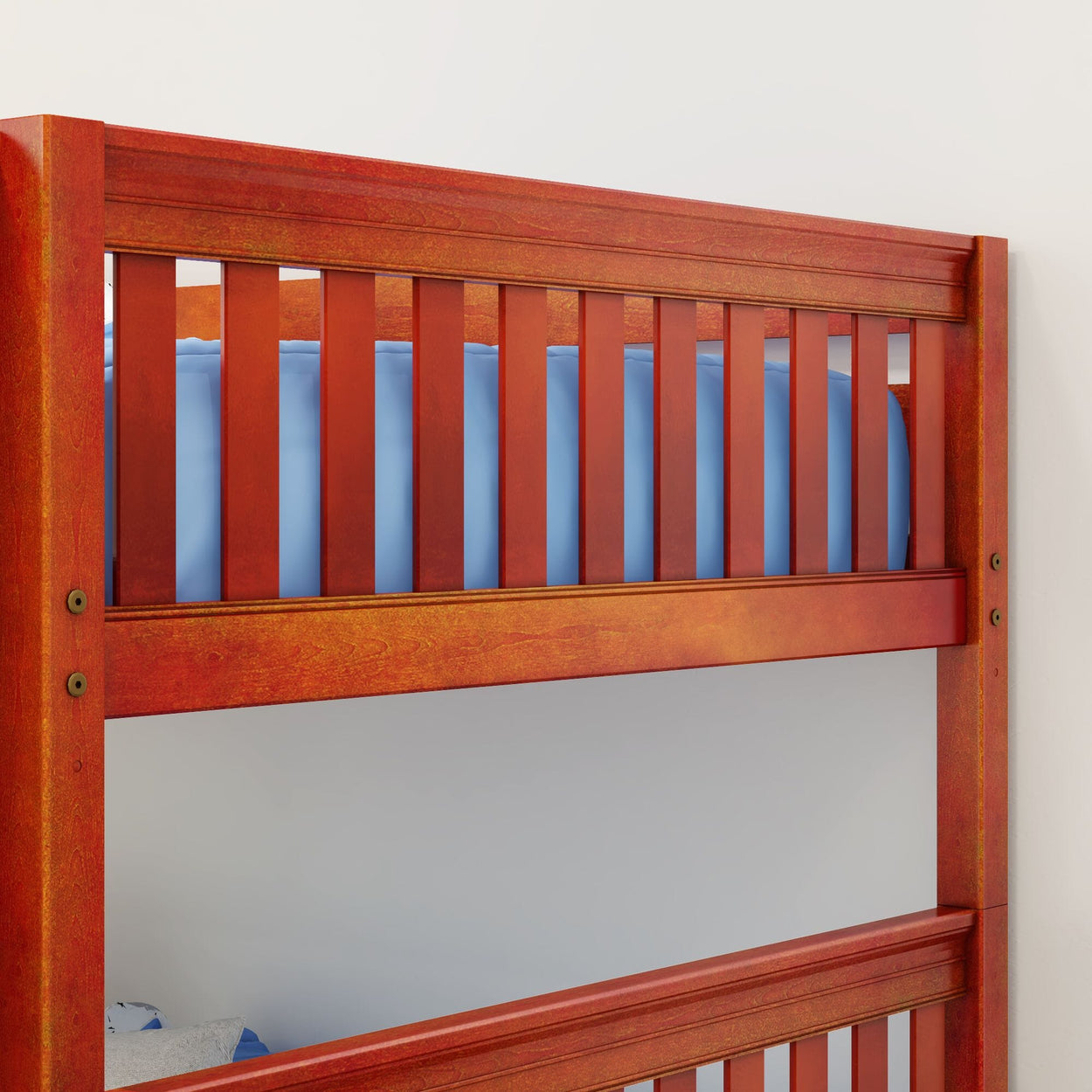 Red wooden bunk bed with blue bedding in a child's room.