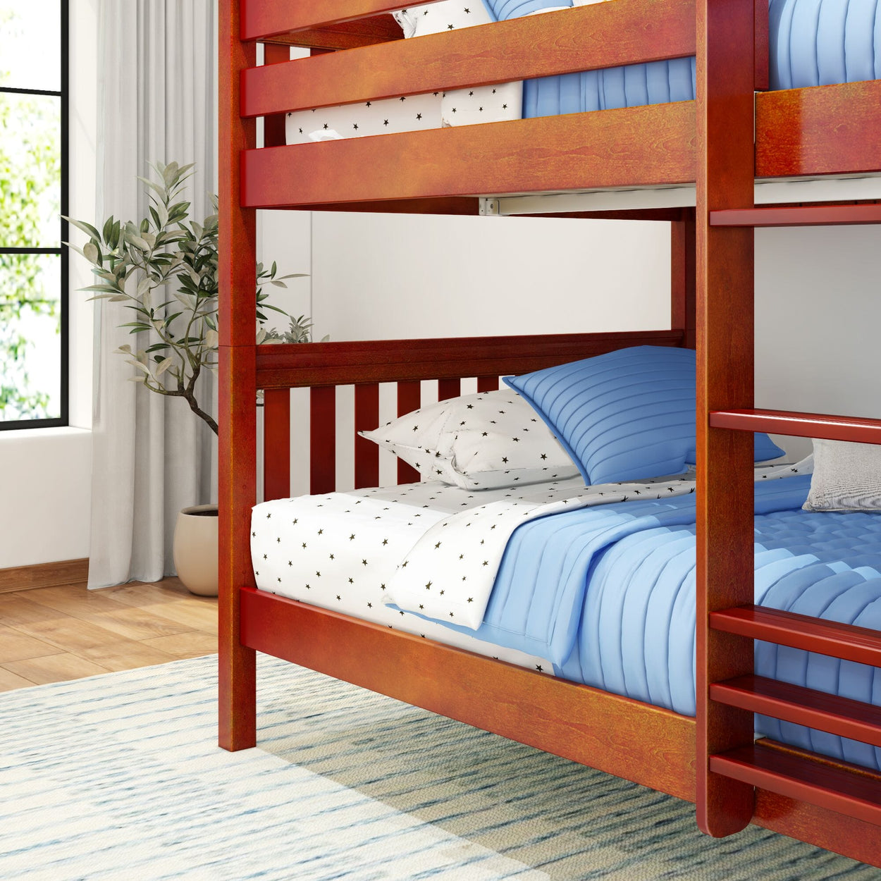 Red wooden bunk bed with blue bedding in a modern bedroom setting.