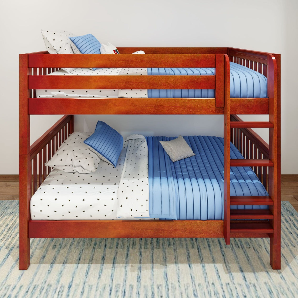 Red wooden bunk bed with blue and white bedding against a white wall.