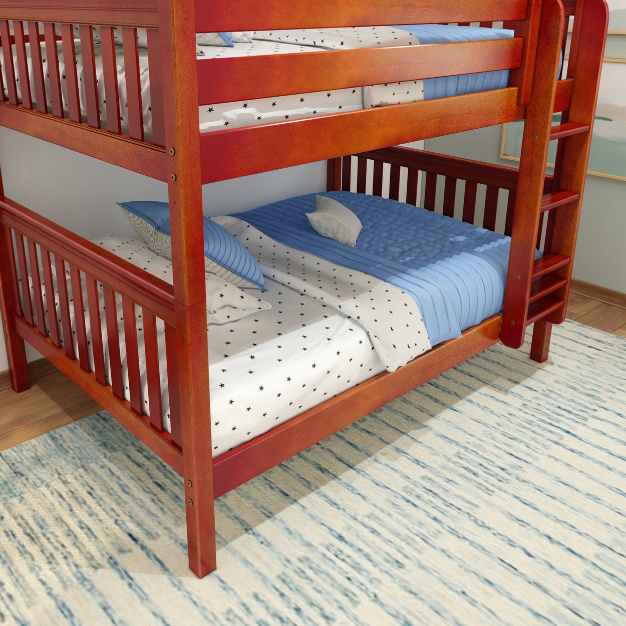 Red wooden bunk bed with blue bedding and star-patterned sheets in a children's room.