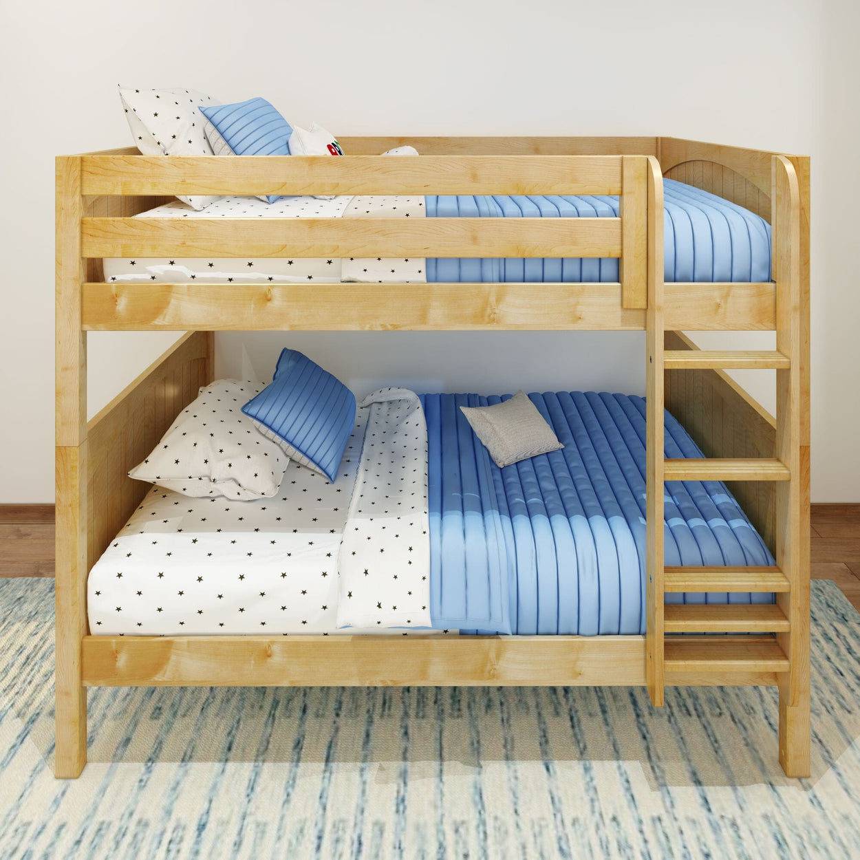 Wooden bunk bed with blue bedding and star-patterned sheets in a cozy bedroom.