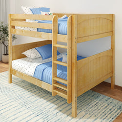Wooden bunk bed with blue striped bedding in a spacious bedroom setting.