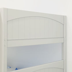White wooden panel headboard for a bed with arch design.