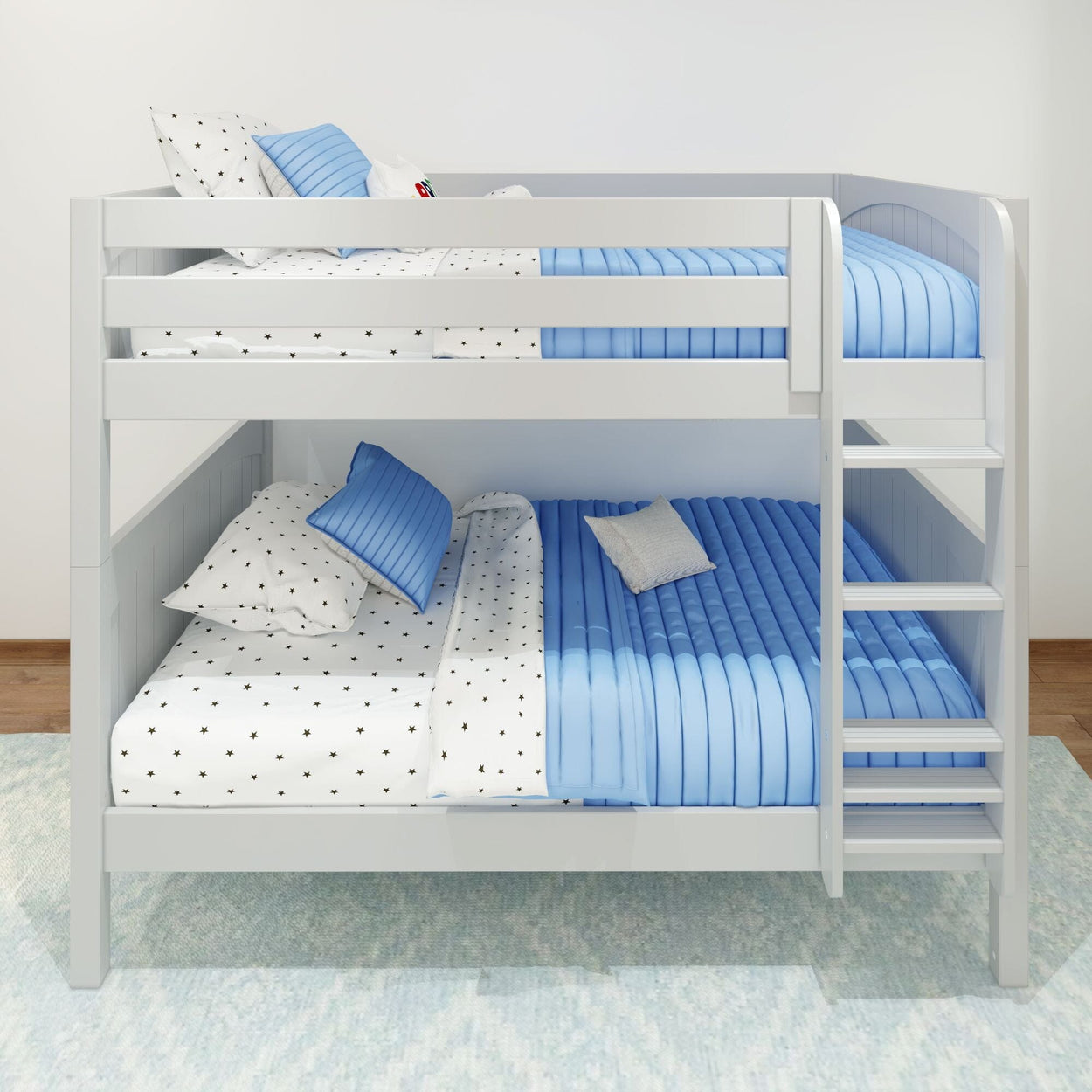 White wooden bunk bed with blue and white bedding in a modern bedroom setting.