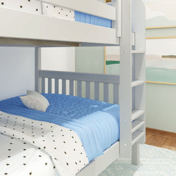 Gray bunk bed with blue bedding and star-patterned sheets in a children's room.