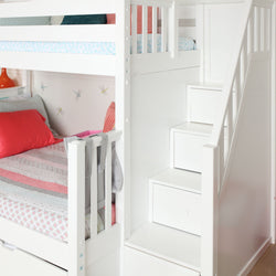 White bunk bed with built-in storage stairs and colorful bedding in a child's bedroom.
