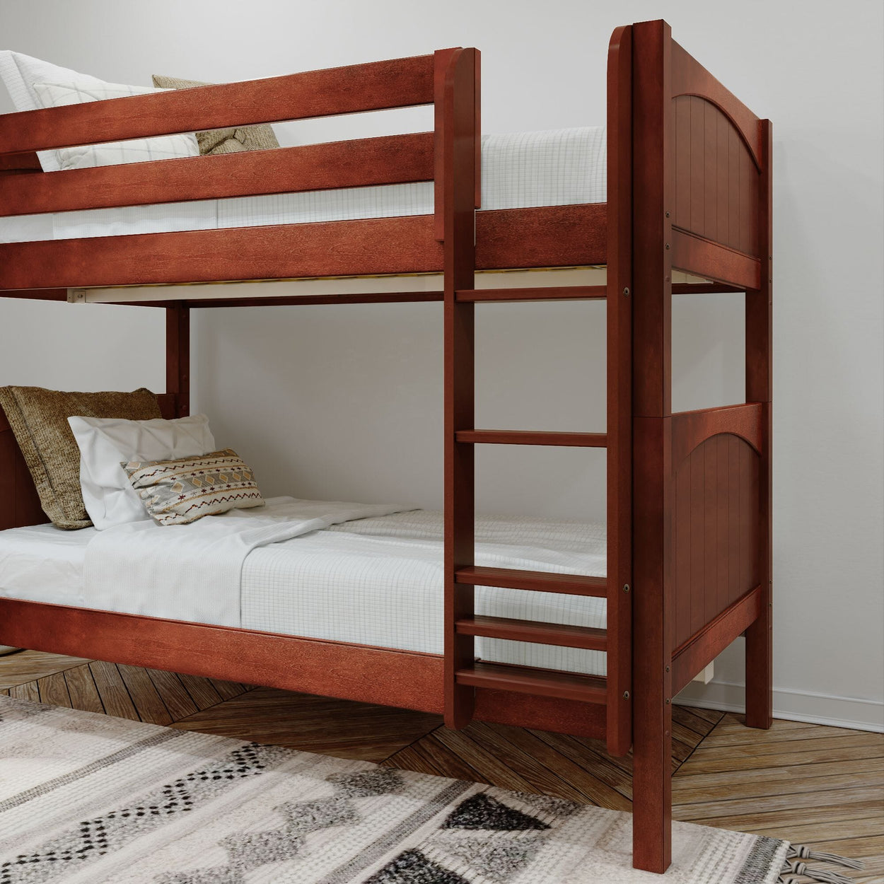 Wooden bunk bed with pillows and blankets on top and bottom bunks in a modern bedroom setting.