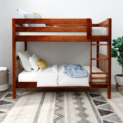 Wooden bunk bed with bedding and decorative pillows in a modern bedroom setting.