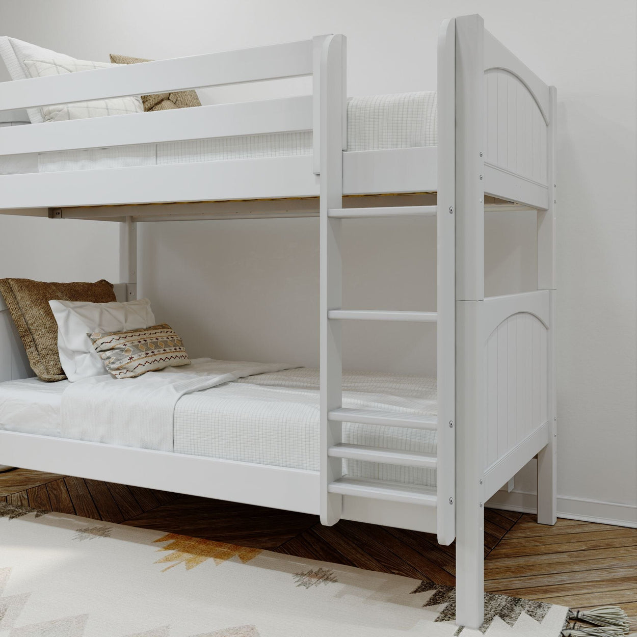 White wooden bunk bed with cozy linens and decorative pillows in a modern bedroom setting.