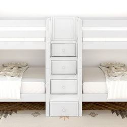 White bunk bed with built-in storage drawers and cozy bedding in a modern bedroom setting.