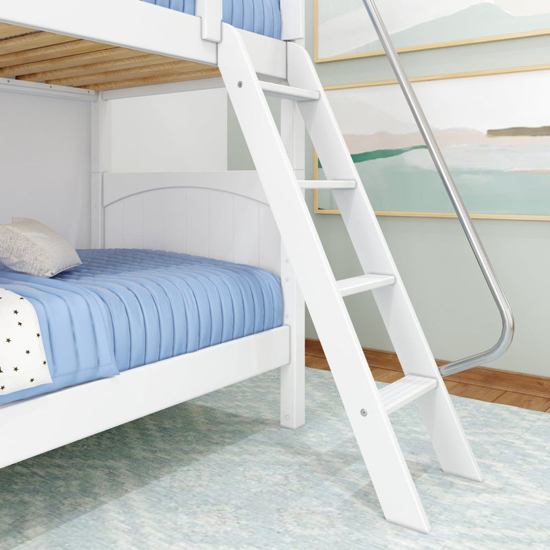 White wooden bunk bed ladder on a kids' loft bed with blue quilted bedding and coastal wall art