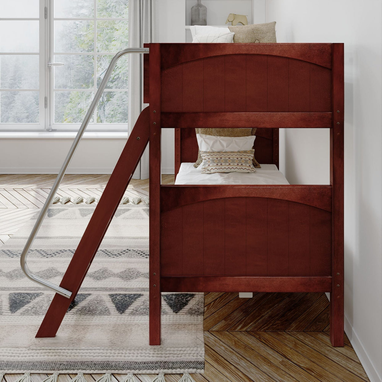 Wooden bunk bed with ladder in a cozy bedroom featuring patterned rug and decorative pillows.