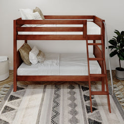 Wooden bunk bed with white bedding and decorative pillows in a modern bedroom setting.