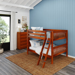 Stylish wooden bunk bed in modern children’s bedroom with blue accent wall and natural light.