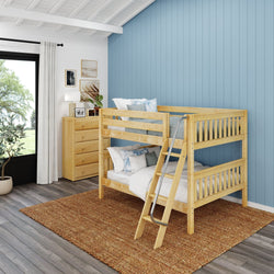 Wooden bunk bed in a cozy bedroom with blue accent wall and natural light.