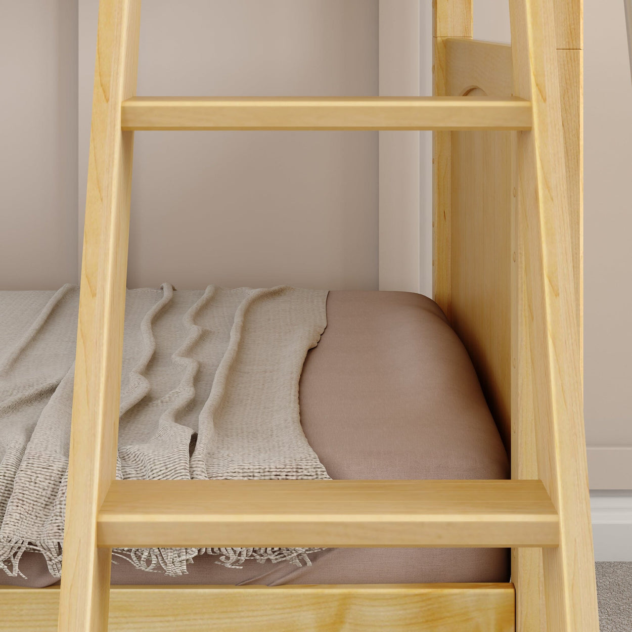 Bunk bed with light wooden ladder and cozy blanket, ideal for small spaces and kids' rooms.