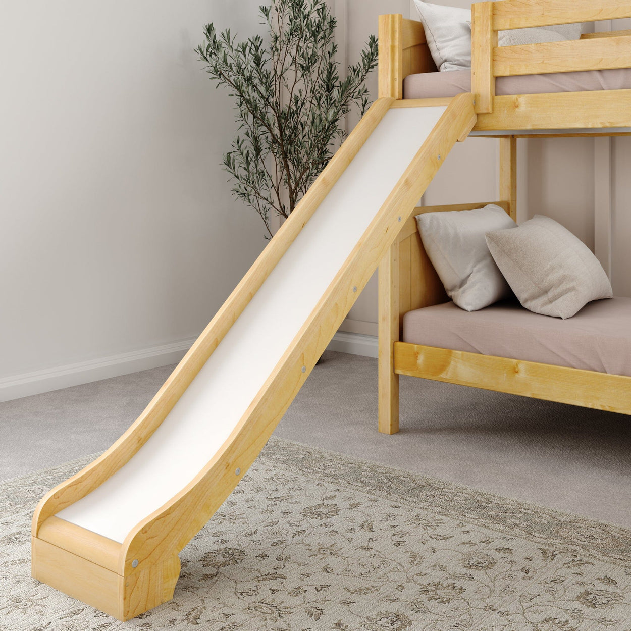 Wooden bunk bed with slide, featuring a cozy design and bedding, ideal for kids' bedroom furniture.