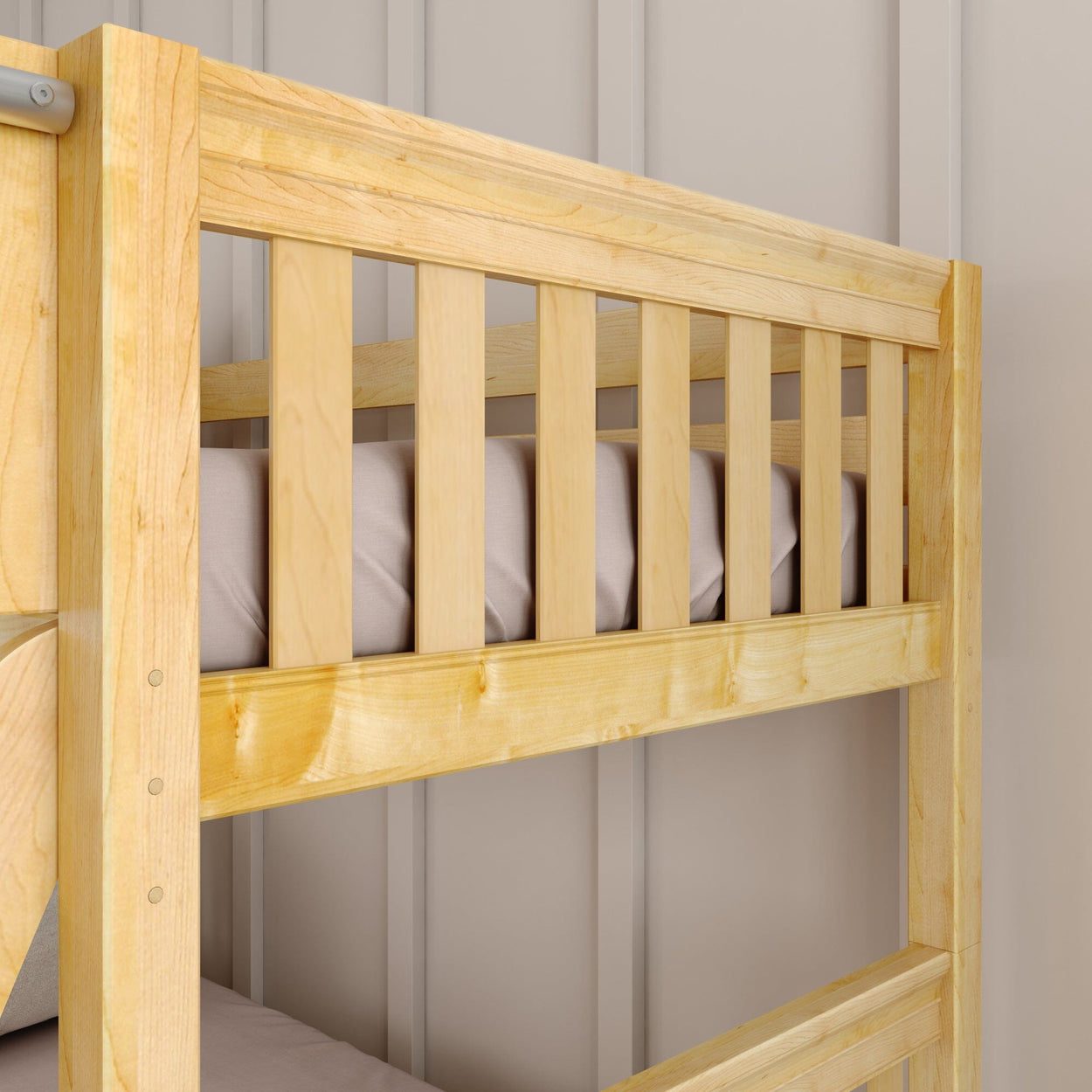Wooden bunk bed frame with beige wall background.