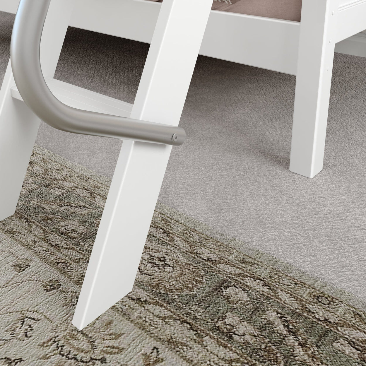 White bunk bed ladder detail with carpeted floor and patterned rug.