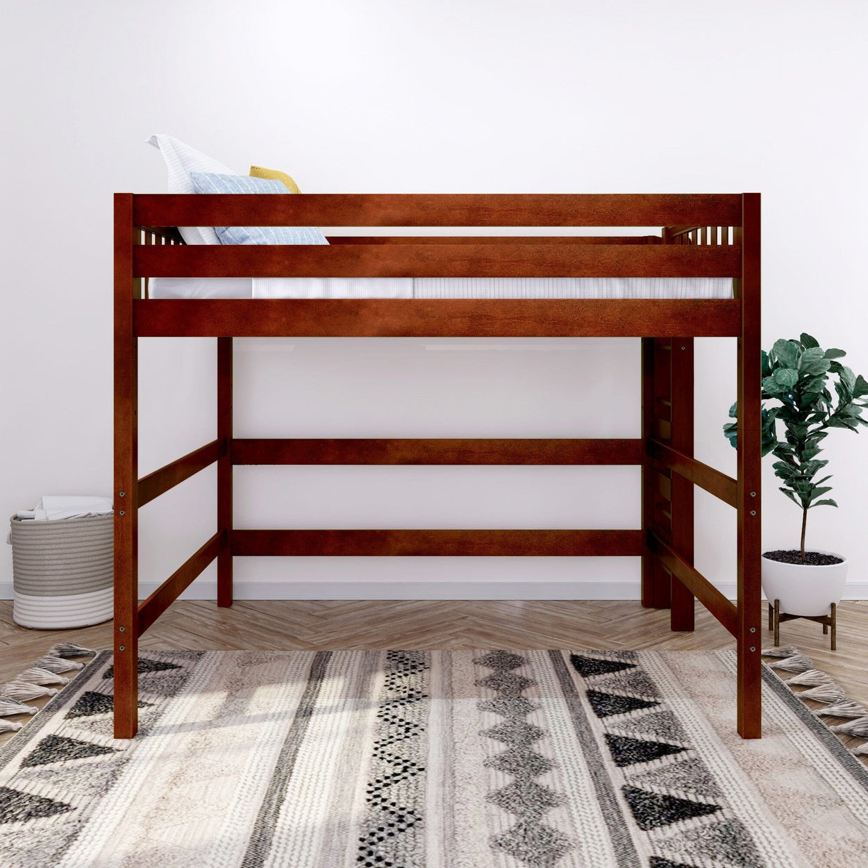 Wooden loft bed with white bedding in modern minimalist bedroom with decorative plant and geometric-patterned rug.