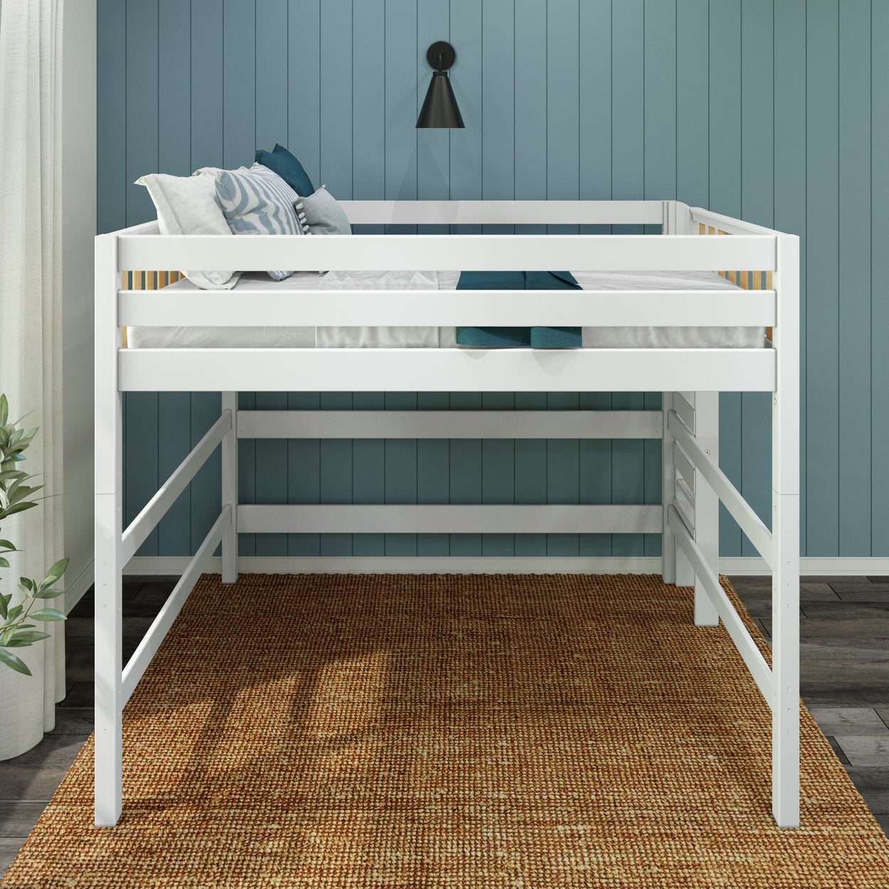 White loft bed with blue accent wall and brown rug in modern bedroom.
