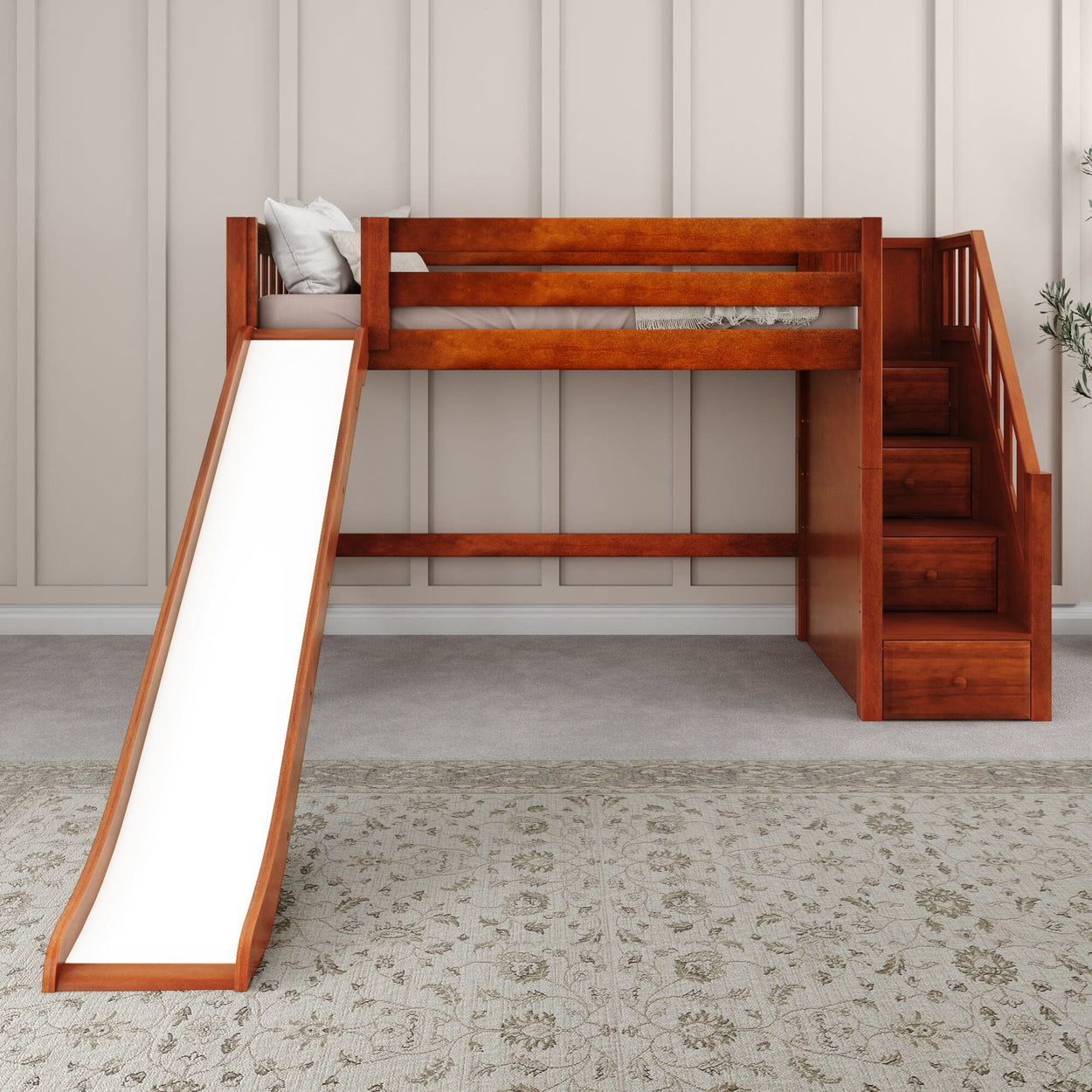 Children's wooden loft bed with slide and storage stairs in a modern bedroom.