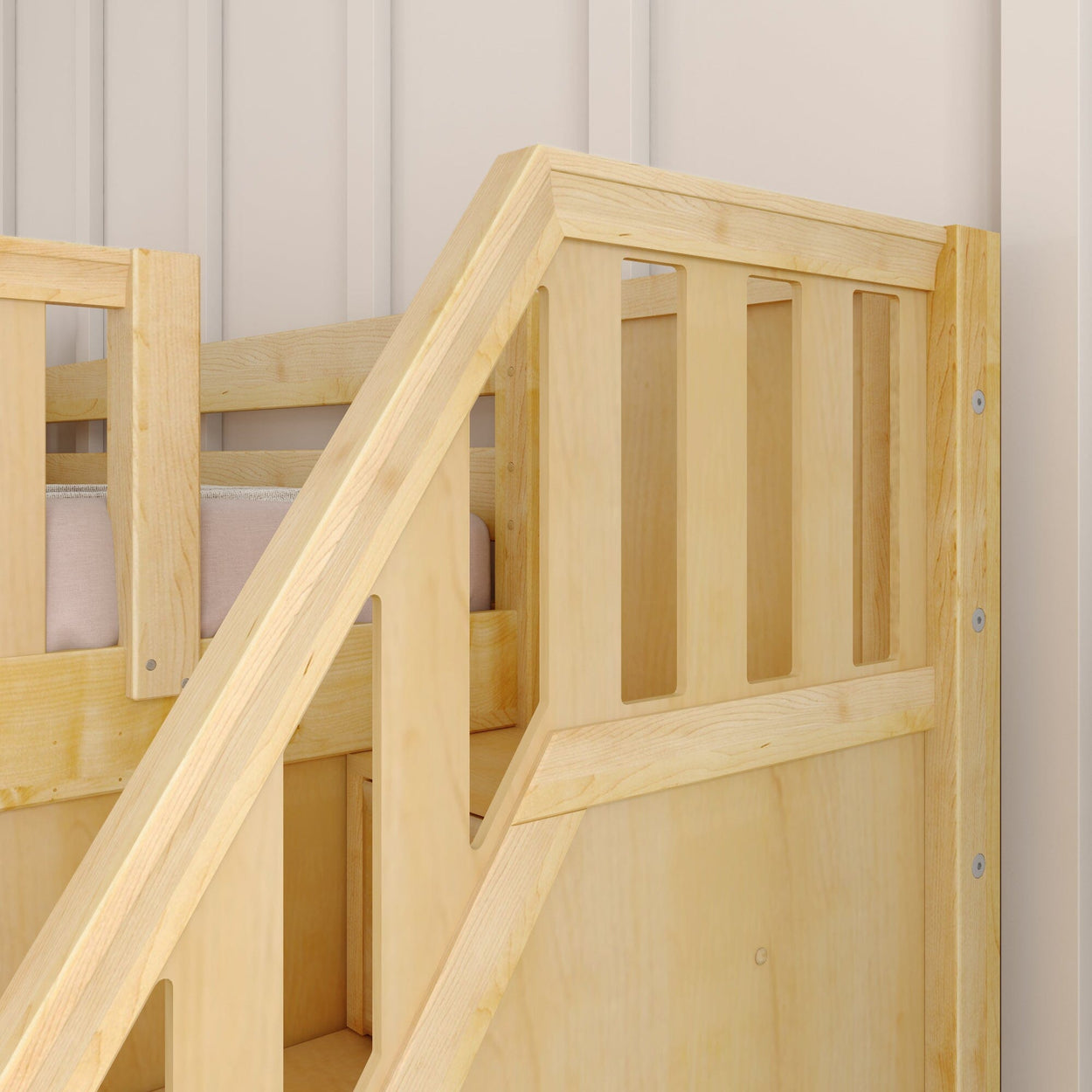 Wooden bunk bed with integrated safety railing and natural finish.