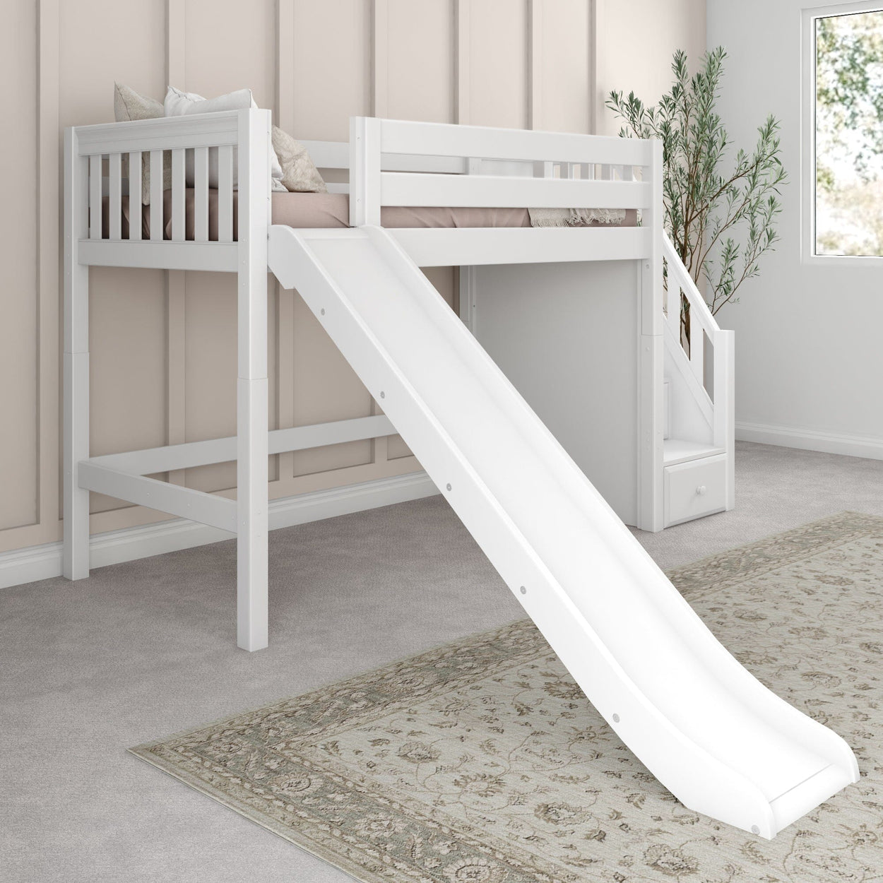 White kids' loft bed with built-in slide and storage stairs in a modern bedroom.