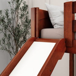 Wooden loft bed with slide and tree decor in modern bedroom.