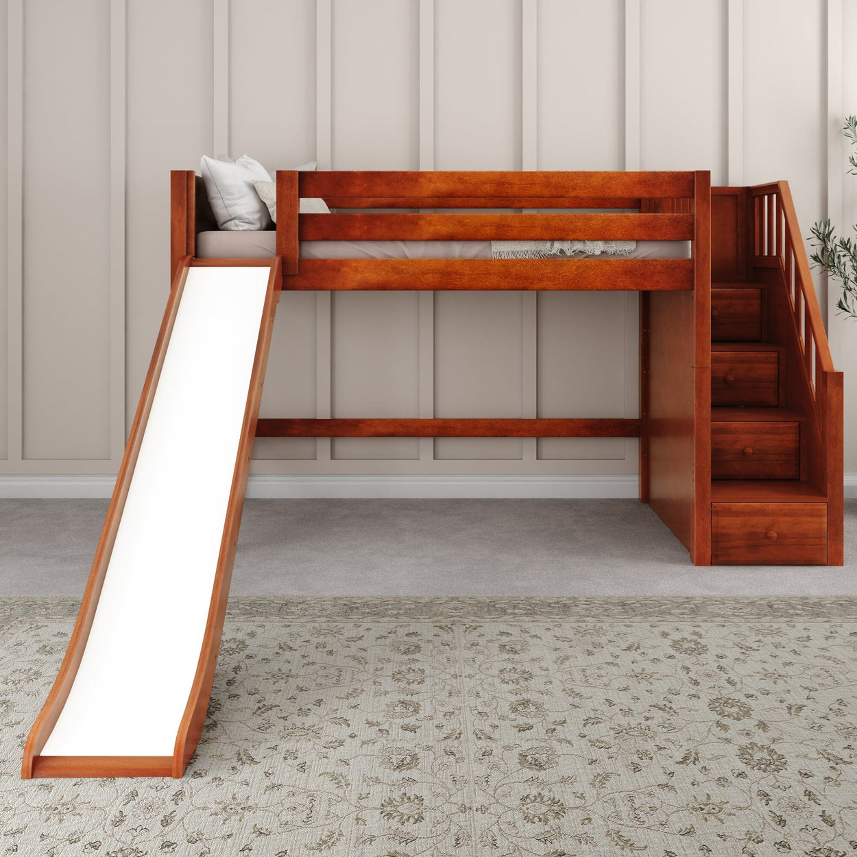 Wooden loft bed with slide and stairs for kids in a cozy bedroom setting.