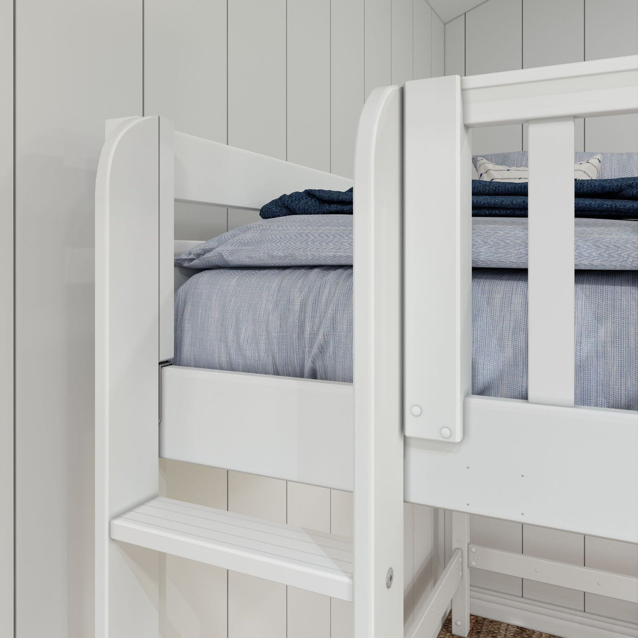 White bunk bed with gray bedding against a light paneled wall in a modern bedroom setting.