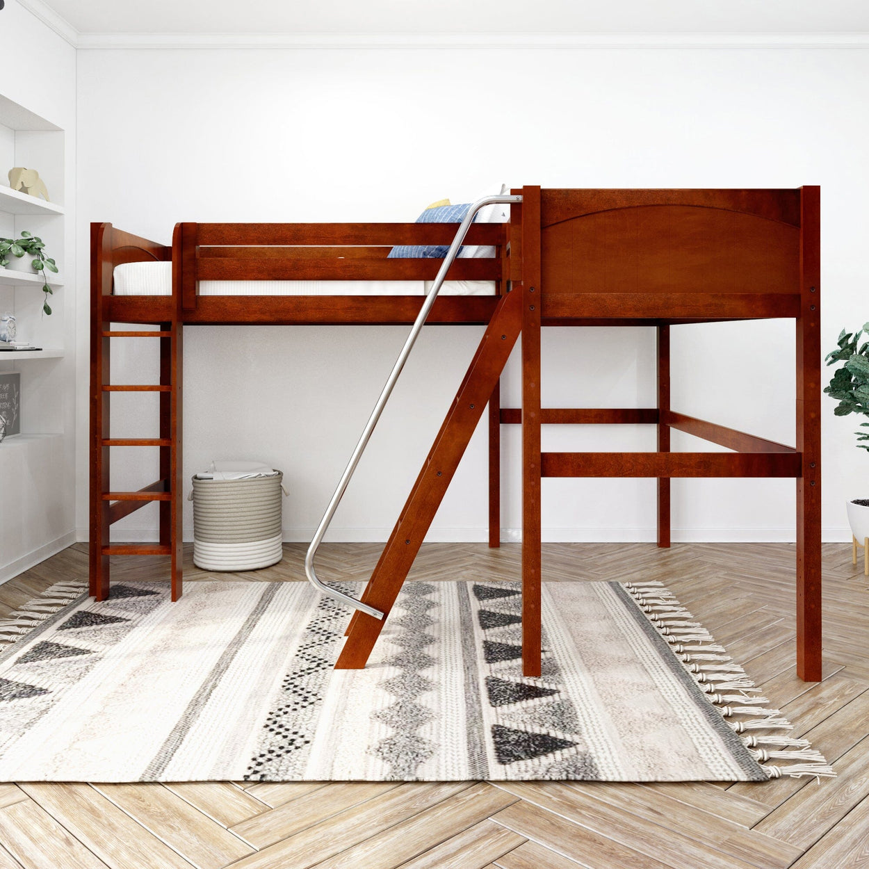 Wooden loft bed with ladder and slide in a modern bedroom on a patterned rug.