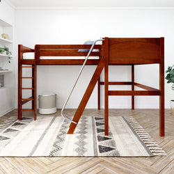 Wooden loft bed with ladder and slide in a modern bedroom on a patterned rug.