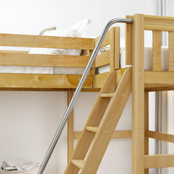 Wooden loft bed with ladder and metal handrail in bright bedroom.
