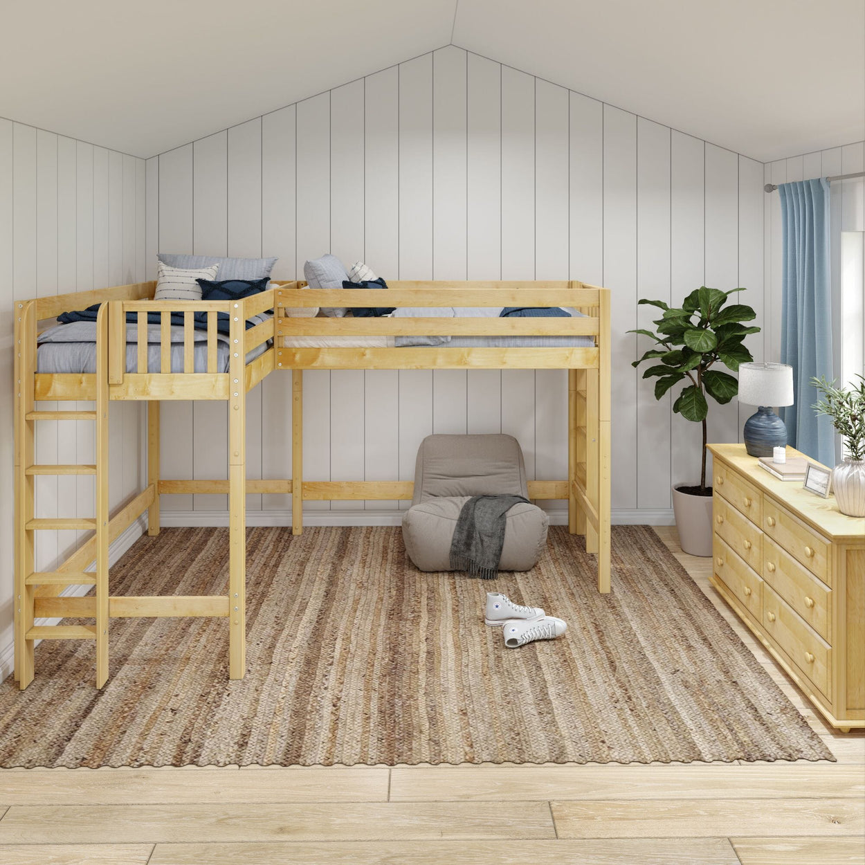 Wooden L-shaped bunk bed in a cozy, modern bedroom with a striped rug and natural light.