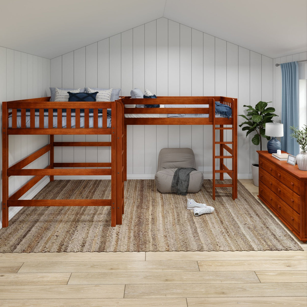 Loft bed in a modern kids' room with wooden furniture, cozy bean bag, and decorative plants.