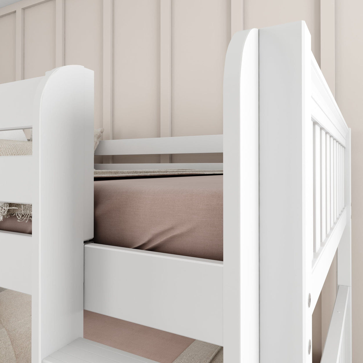 White bunk bed with beige bedding against a neutral wall in a modern bedroom setting.