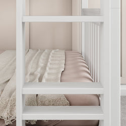 White bunk bed with cozy pink bedding and soft beige blanket, ideal for modern bedroom design.