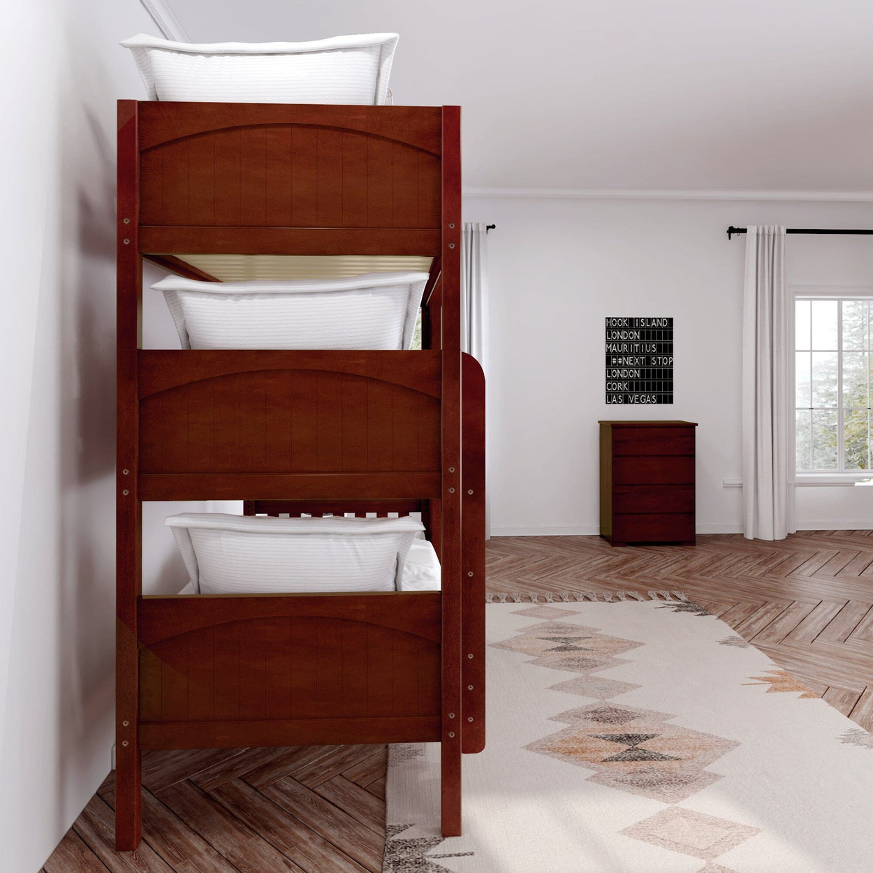 Three-tier wooden bunk bed in modern bedroom with white walls and large window.