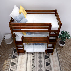 Wooden bunk bed with white bedding and decorative pillows in a modern bedroom with patterned rug and indoor plant.