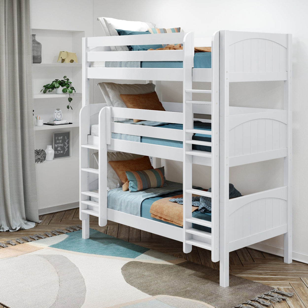 White wooden bunk bed with blue and orange bedding in a modern bedroom with a patterned rug and decorative shelving.