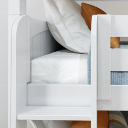 White bunk bed with pillows and blankets, ideal for modern bedroom furniture setup.