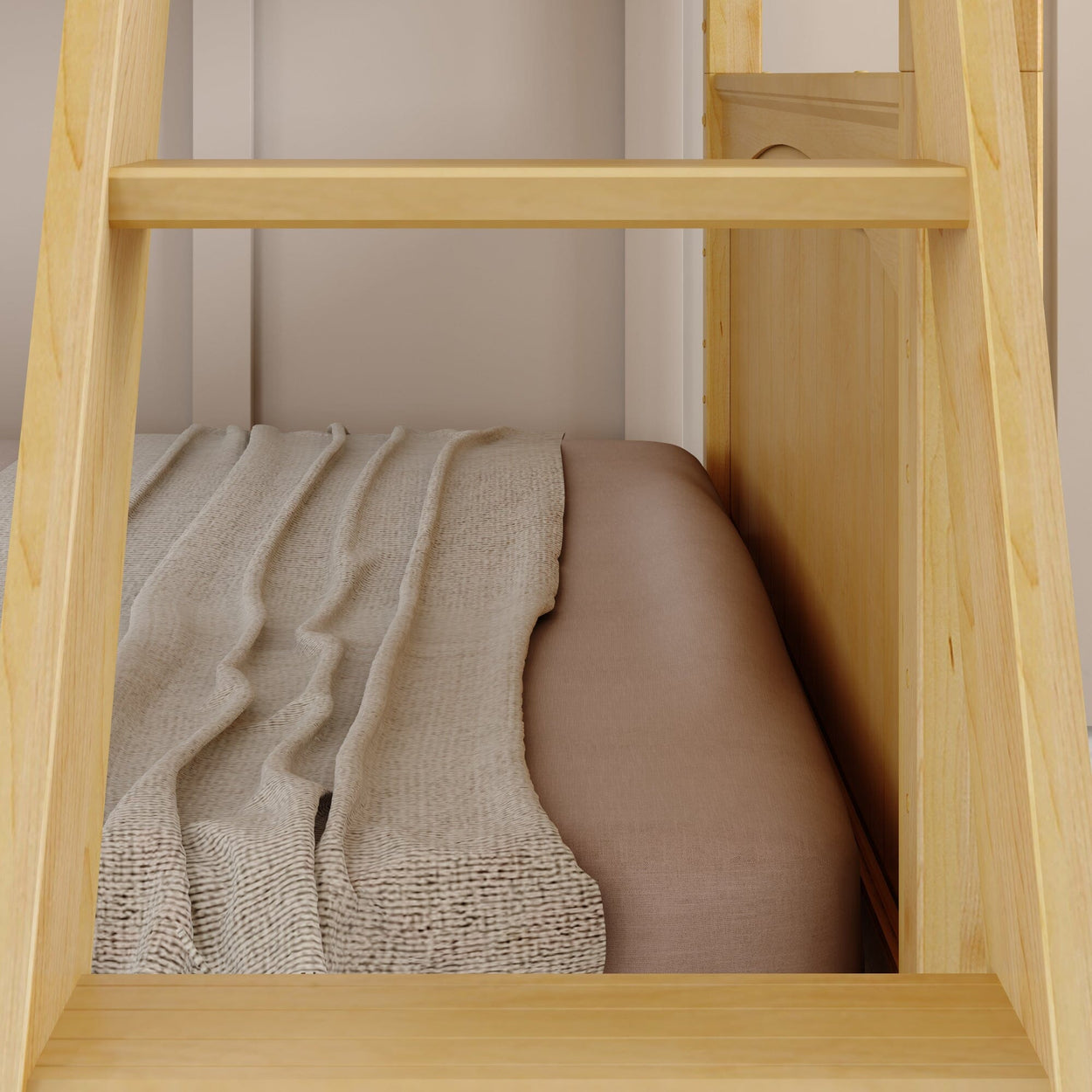 Wooden bed frame with a beige mattress and textured blanket.